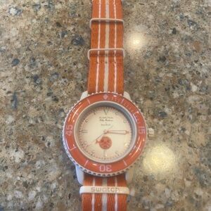 New Swatch Vibrant Automatic Orange and White Timepiece
